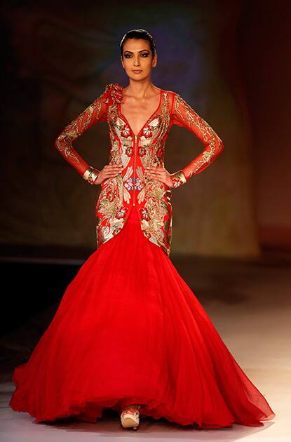 A model displays a dress created by Indian designer Gaurav Gupta at the India Couture Week, held by the Fashion Design Council of India, in New Delhi.