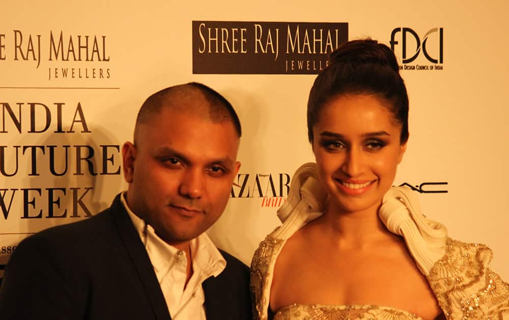 Gaurav Gupta & Shraddha Kapoor at the Shree Raj Mahal Jewellers India Couture Week 2014.