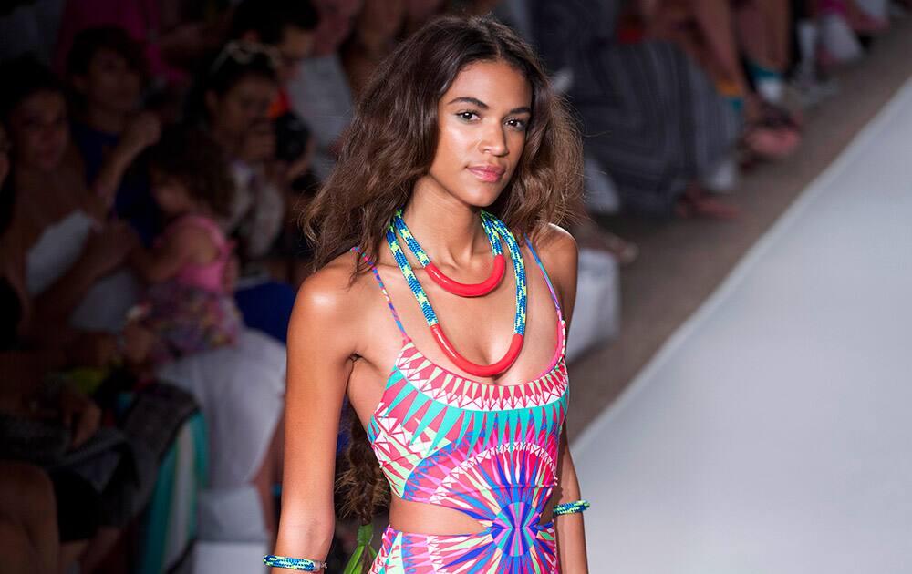 A model walks down the runway wearing swimwear from the Mara Hoffman Swim collection during the Mercedes-Benz Fashion Week Swim show.