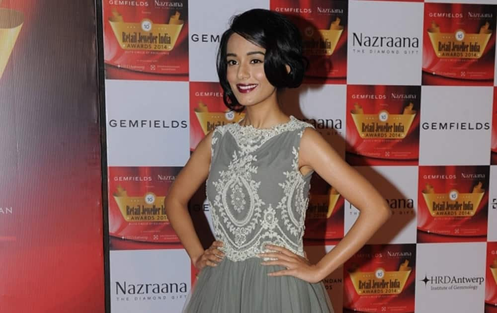 Bollywood actor Amrita Rao during the 10th Annual Gemfields and Nazraana Retail Jeweller India Awards 2014 in Mumbai. dna