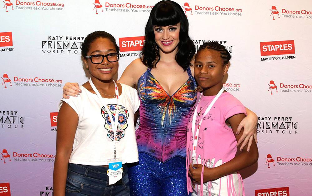 Global pop star Katy Perry with local students backstage at the CONSOL Energy Center during her Prismatic World Tour performance in Pittsburgh. 