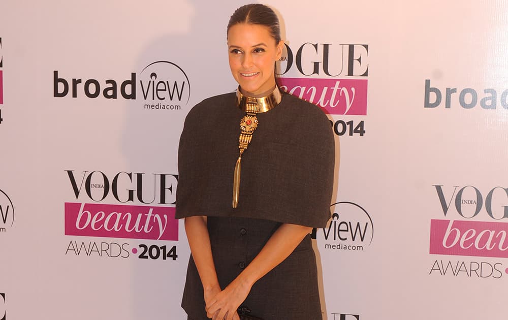 Bollywood actor Neha Dhupia during the Vogue Beauty Awards 2014 in Mumbai. dna