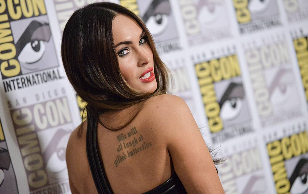 Megan Fox attends the 'Teenage Mutant Ninja Turtles' press line on Day 1 of Comic-Con International in San Diego.