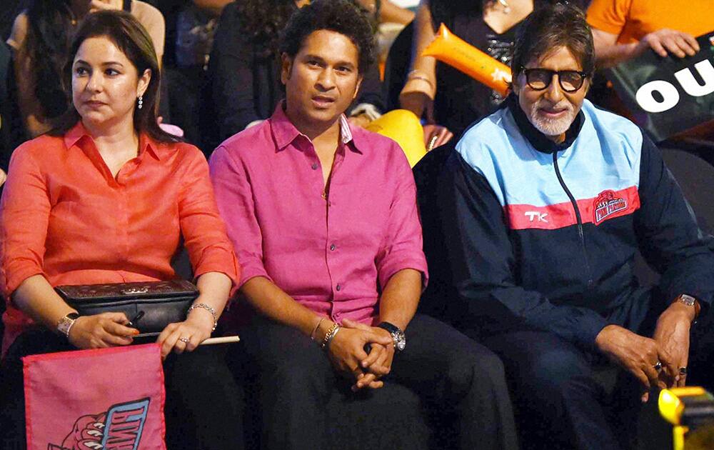 Amitabh Bachchan and cricket legend Sachin Tendulkar and his wife Anjali during the pro kabaddi match played between U Mumba and Pink Panthares in Mumbai .