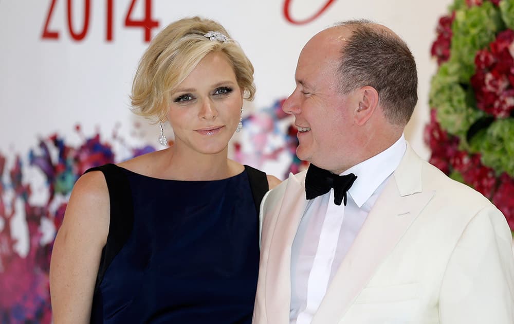 Prince Albert II of Monaco with his wife Princess Charlene, arrive at the 'Monaco Red Cross Ball', in Monaco. The Monaco Red Cross Ball is a charity gala evening brings together high society as well as donors from all over the world.