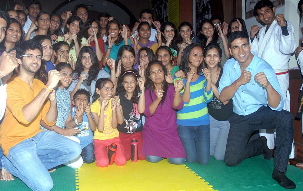 Bollywood actor Akshay Kumar with Shivsena Yuva President Aditya Thackeray along with first batch of Girls & women who complited self defence course at Shahaji Raje Bhosale Sports Complex in Mumbai.