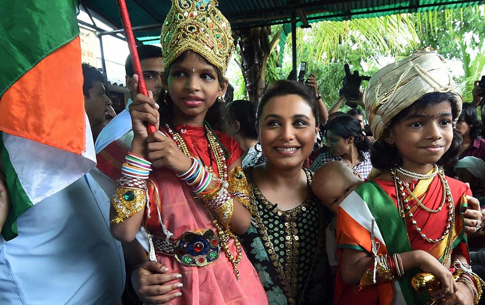 Rani Mukerji with school students at a promotional event in Mumbai.