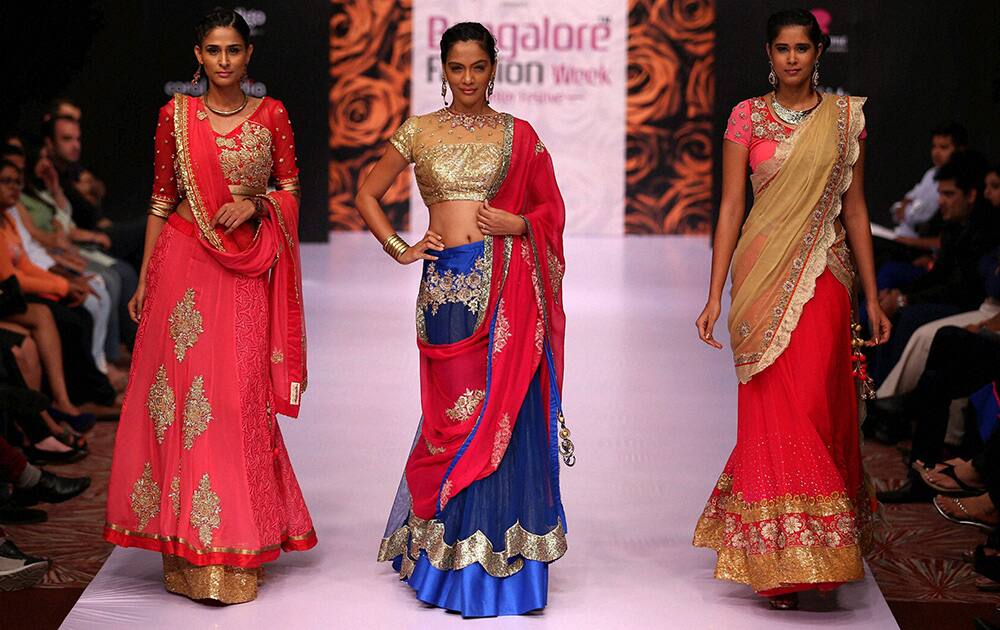 Models walk the ramp as they showcase the creation of designer Shivani Gelera during the 2nd day of Bangalore Fashion Week in Bengaluru.