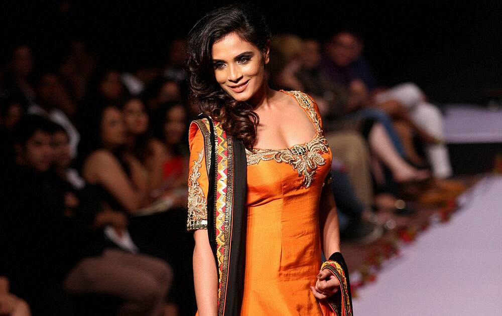 Bollywood actress Richa Chadda showcasing the creation of designer Archanna Kochhar during the 1st day of Bangalore Fashion Week in Bengaluru.