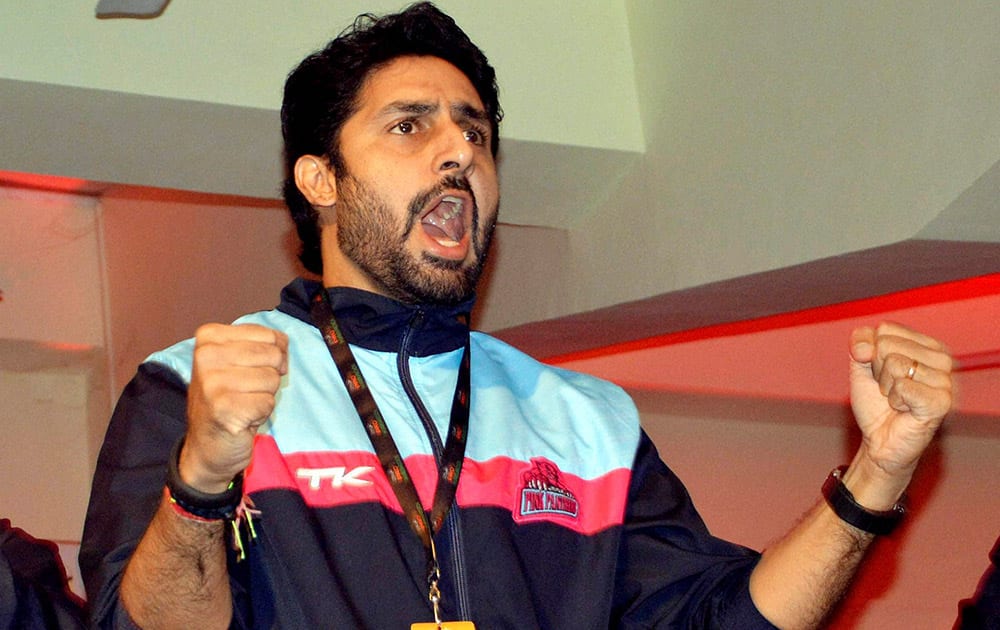 Bollywood actors Abhishiek Bachchan cheers his team during Pro Kabadi league match in Patna.