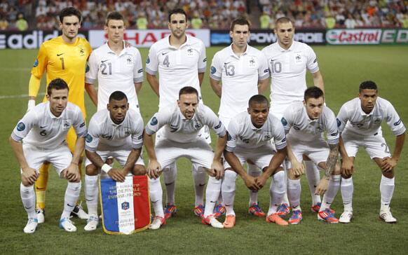 France goalkeeper Hugo Lloris, Laurent Koscielny, Adil Rami, Anthony Reveillere, Karim Benzema, left top left, Yohan Cabaye, Yann M'Vila, Franck Ribery, Florent Malouda, Mathieu Debuchy and Gael Clichy, from bottom left, pose for a team photo, before the Euro 2012 soccer championship quarterfinal ma