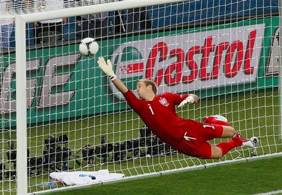 England goalkeeper Joe Hart tries to get a shot that eventually hit the post during the Euro 2012 soccer championship quarterfinal match between England and Italy in Kiev, Ukraine, Sunday, June 24, 2012.