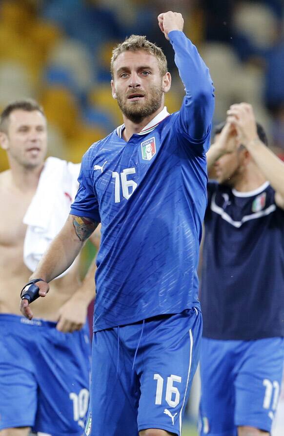 Italy's Daniele De Rossi celebrates after Italy won the Euro 2012 soccer championship quarterfinal match between England and Italy in Kiev, Ukraine.