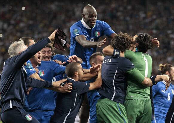 Italy players celebrate after Alessandro Diamanti scored the decisive penalty shootout during the Euro 2012 soccer championship quarterfinal match between England and Italy in Kiev, Ukraine.