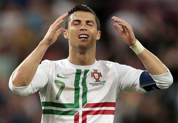 Portugal's Cristiano Ronaldo reacts after performing a freekick during the Euro 2012 soccer championship semifinal match between Spain and Portugal in Donetsk, Ukraine, Wednesday, June 27, 2012. 