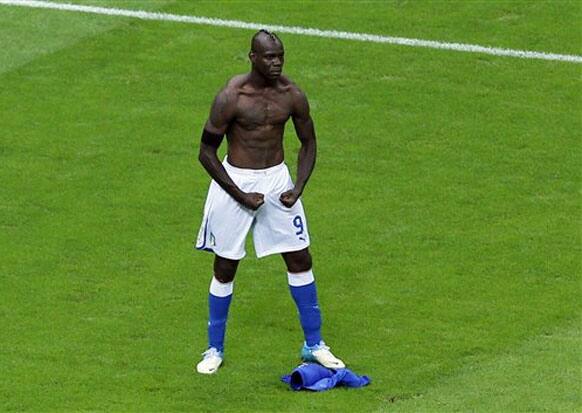 Italy's Mario Balotelli celebrates scoring his side's second goal during the Euro 2012 soccer championship semifinal match between Germany and Italy in Warsaw, Poland, Thursday, June 28, 2012. 