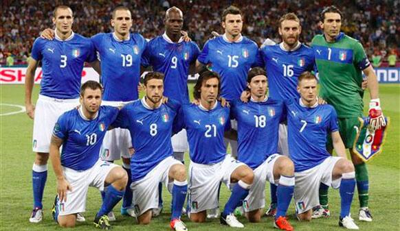 Italy's Giorgio Chiellini, Leonardo Bonucci, Mario Balotelli, Andrea Barzagli, Daniele De Rossi and goalkeeper Gianluigi Buffon, back row from left, and, front row from left, Antonio Cassano, Claudio Marchisio, Andrea Pirlo, Riccardo Montolivo and Ignazio Abate pose for a team group during the Euro.