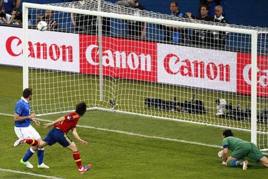 Spain's David Silva, second left, scores the opening goal during the Euro 2012 soccer championship final against Italy in Kiev, Ukraine, Sunday, July 1, 2012