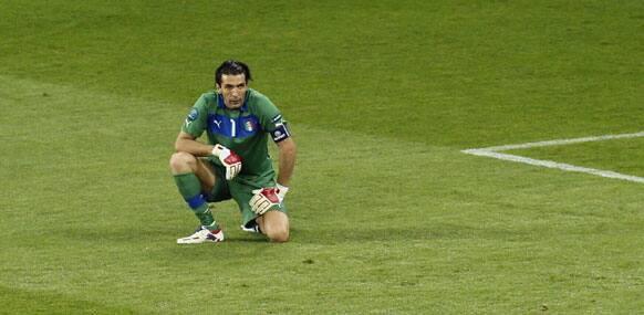 Italy goalkeeper Gianluigi Buffon reacts after Spain scored the second goal during the Euro 2012 soccer championship final between Spain and Italy in Kiev, Ukraine, Sunday, July 1, 2012.