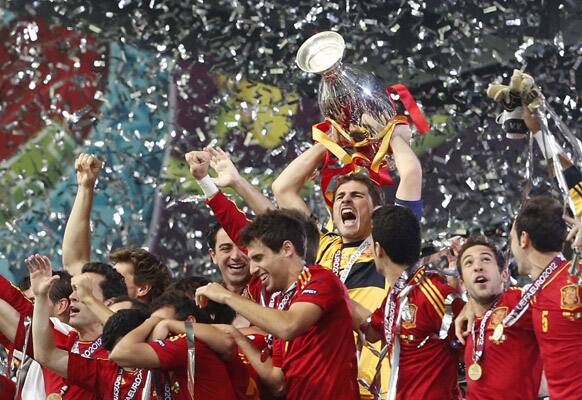 Spain goalkeeper Iker Casillas lifts the trophy after the Euro 2012 soccer championship final between Spain and Italy in Kiev, Ukraine.