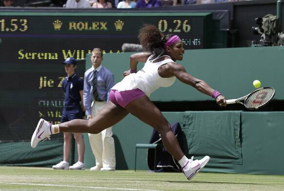 Serena Williams of the United States plays a return to Zheng Jie of China during a third round women's singles match at the All England Lawn Tennis Championships at Wimbledon.