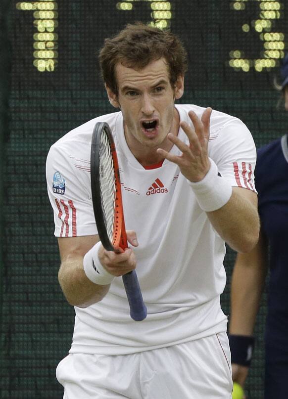 Andy Murray of Britain reacts during the men's singles final match against Roger Federer of Switzerland at the All England Lawn Tennis Championships at Wimbledon, England, Sunday, July 8, 2012. 