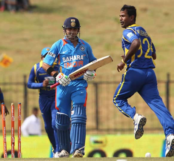 Sri Lanka`s bowler Nuwan Kulasekara celebrates the dismissal Gautam Gambhir, during the first one-day international cricket match between Sri Lanka and India in Hambantota, Sri Lanka.