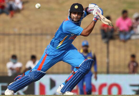 Virat Kohli bats during the first one-day international cricket match between Sri Lanka and India in Hambantota, Sri Lanka.