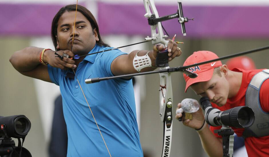 India's Jayanta Talukdar aims for the target during an individual ranking round at the 2012 Summer Olympics in London.