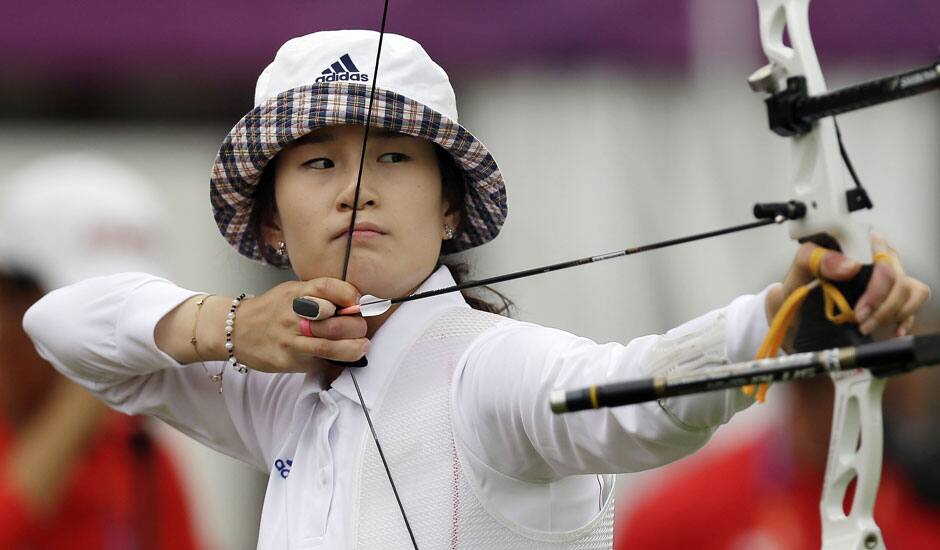 South Korea's Ki Bo-bae aims for the target during an individual ranking round at the 2012 Summer Olympics, in London. 