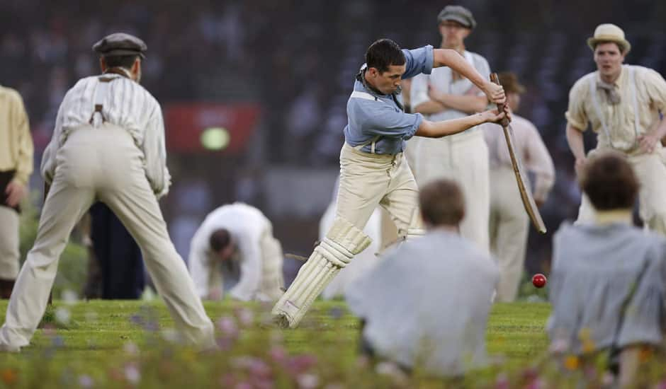 Performers play a game of cricket during the Opening Ceremony at the 2012 Summer Olympics in London.