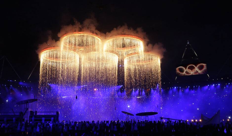 The Olympic rings are lit with pyrotechnics during the Opening Ceremony at the 2012 Summer Olympics in London.