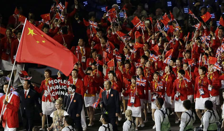 China's Jianlian Yi carries the flag during the Opening Ceremony at the 2012 Summer Olympics in London.