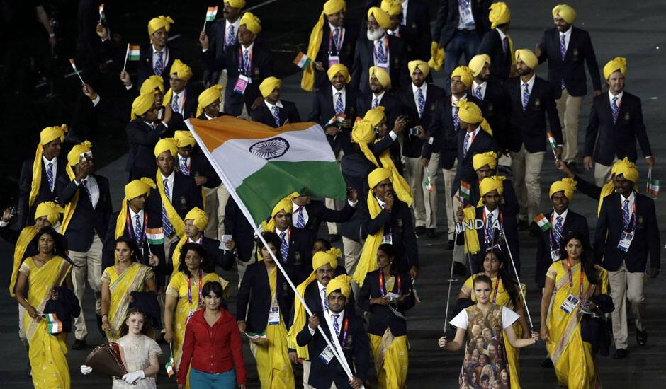 India's Sushil Kumar carries the flag during the Opening Ceremony at the 2012 Summer Olympics  in London.