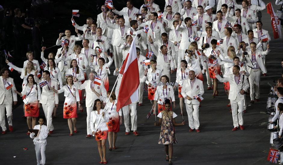 Poland's Agnieszka Radwanska carries the flag during the Opening Ceremony at the 2012 Summer Olympics in London.