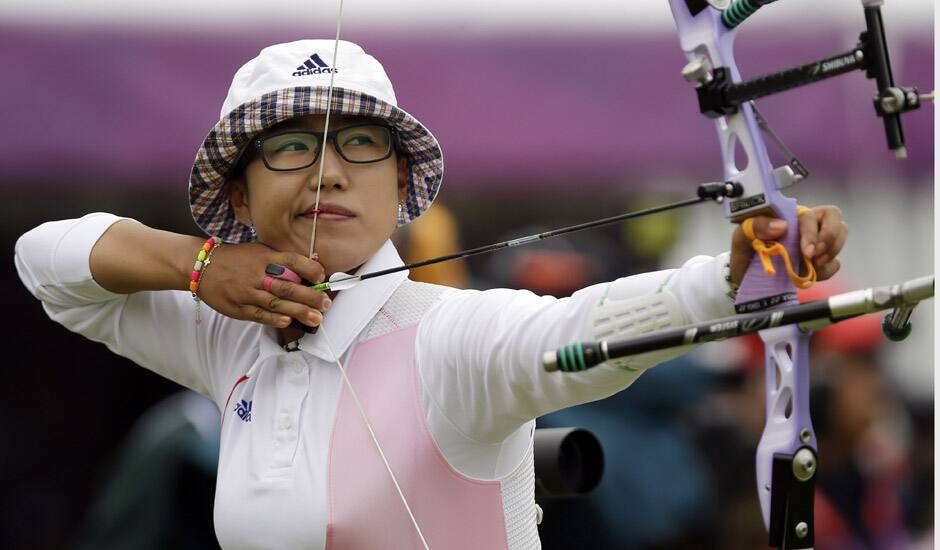 South Korea's Lee Sung-jin aims for the target during an individual ranking round at the 2012 Summer Olympics in London. 