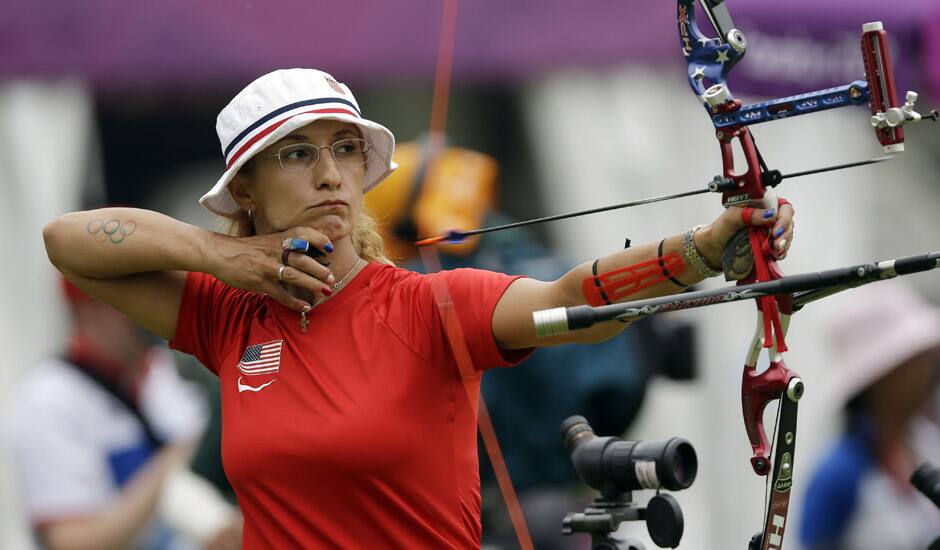 United State's Khatuna Lorig releases her arrow during an individual ranking round at the 2012 Summer Olympics in London.