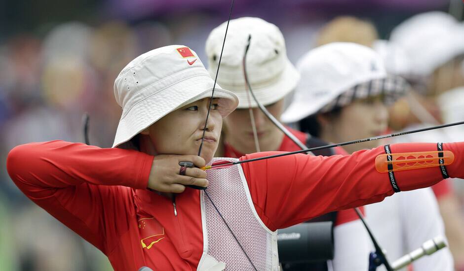 China's Ming Cheng aims during an individual ranking round at the 2012 Summer Olympics in London.