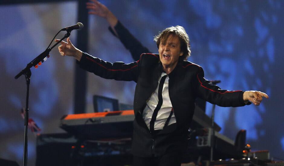 Paul McCartney performs during the Opening Ceremony at the 2012 Summer Olympics in London.