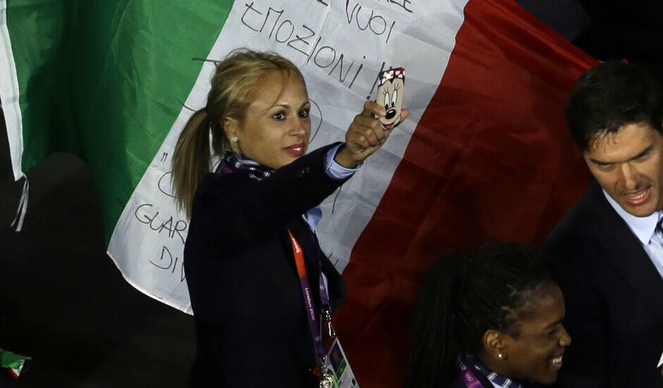 The Italian team parade during the Opening Ceremony at the 2012 Summer Olympics in London.