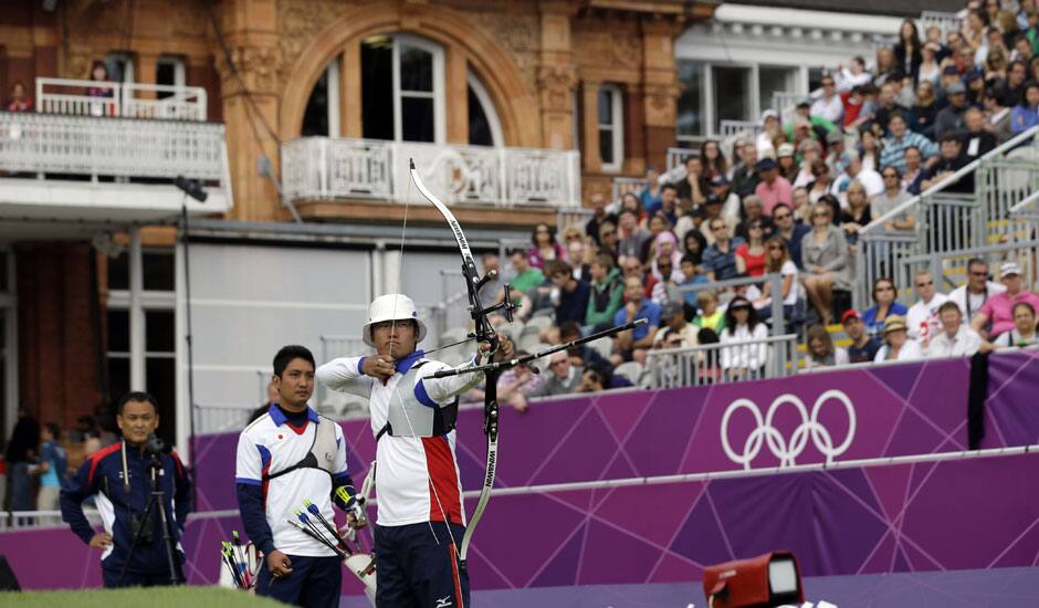 Japan's Takahuru Furukawa aims for the target during the team elimination stage at the 2012 Summer Olympics in London.