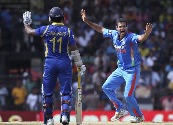 Irfan Pathan appeals unsuccessfully for a leg before the wicket's decision against Sri Lanka's batsman, Dinesh Chandimal, unseen, as non-striker Kumar Sangakkara, gestures during their third one-day international cricket match in Colombo.