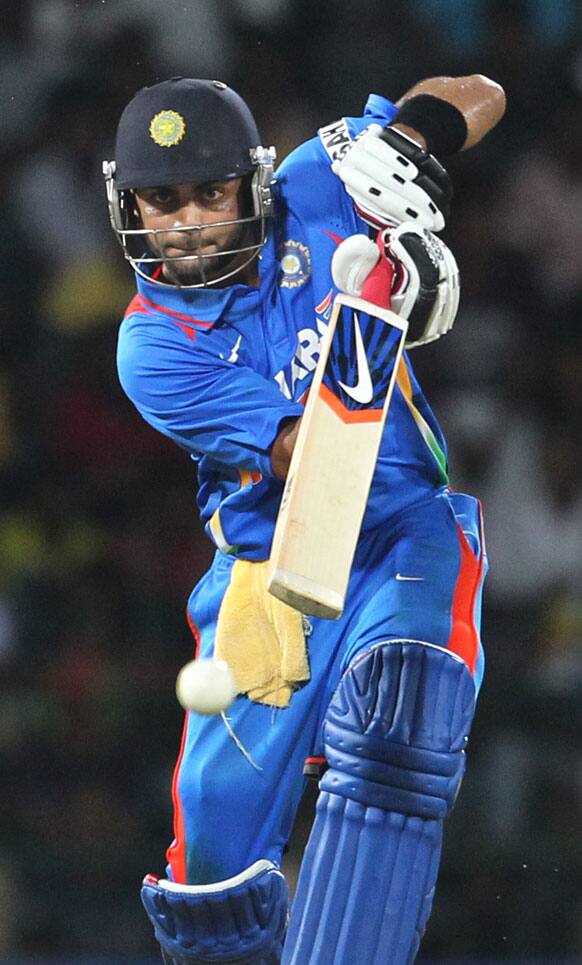 Virat Kohli bats during the third one-day international cricket match between India and Sri Lanka in Colombo.