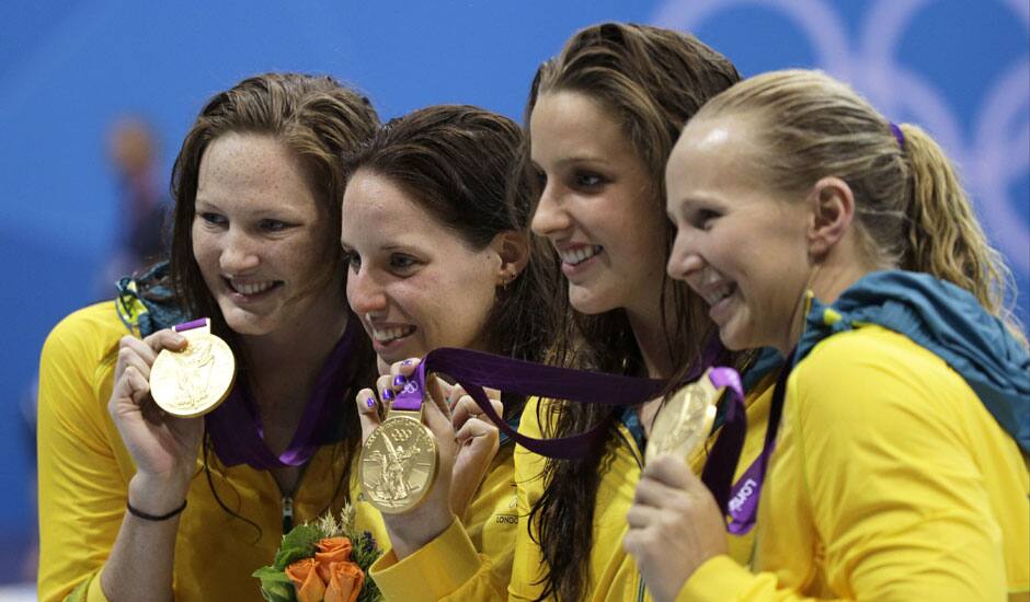 From left, Australia's Alicia Coutts, Cate Campbell, Brittany Elmslie and Melanie Schlanger pose with their gold medals for the women's 4x100-meter freestyle relay swimming final at the Aquatics Centre in the Olympic Park during the 2012 Summer Olympics in London.