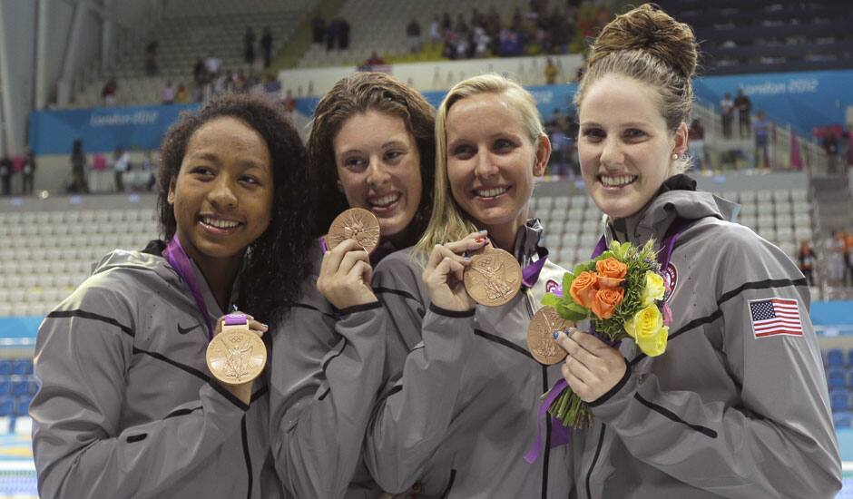 Members of the US women's relay team, from left, Lia Neal, Allison Schmitt, Jessica Hardy and Missy Franklin pose with their bronze medals in the women's 4x100-meter freestyle relay swimming final at the Aquatics Centre in the Olympic Park during the 2012 Summer Olympics in London.