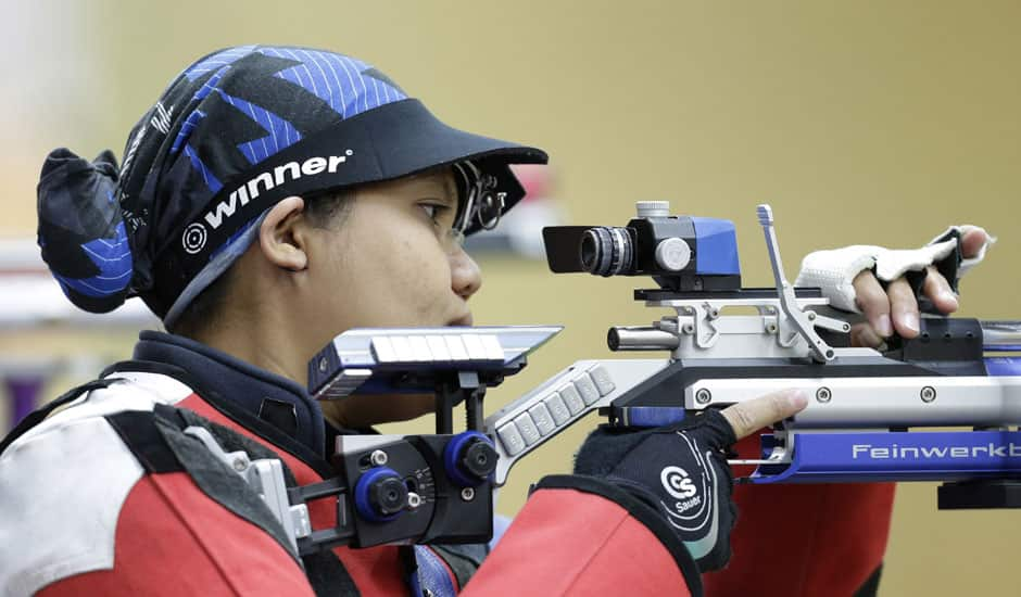 Malaysian shooter Nur Suryani Mohamed Taibi, who is eight months pregnant, competes in the qualifiers for the women's 10-meter air rifle event, at the 2012 Summer Olympics in London.