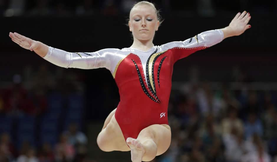 Gymnast Gaelle Mys from Belgium performs on the balance beam during the Artistic Gymnastics women's qualification at the 2012 Summer Olympics in London. 