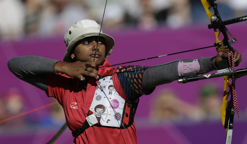 Deepika Kumari shoots during the women's archery team competition at the 2012 Summer Olympics in London.