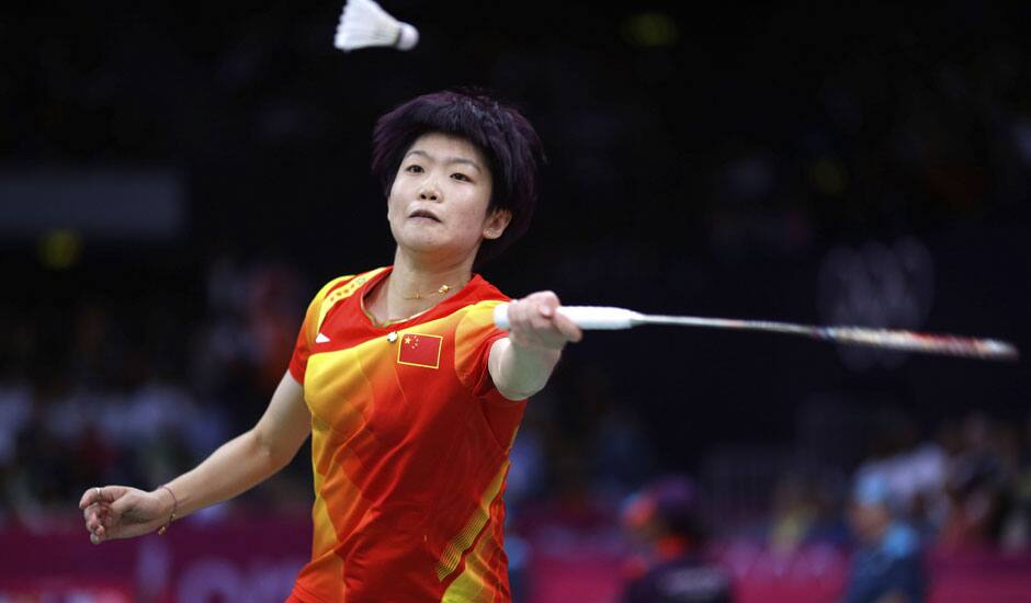 China's Wang Xin plays against United States' Rena Wang at a women's singles match of the 2012 Summer Olympics.