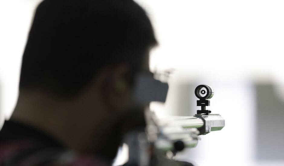 Gagan Narang trains for the 50-meter rifle 3 positions event, at the Royal Artillery Barracks, ahead of the start of the 2012 Summer Olympics in London. 